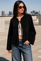Chaqueta Hessed Couture de gamuza con vuelo plisado — Negro